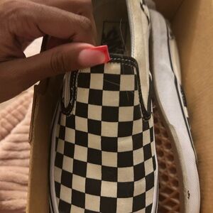 Vans Black and White Checkerboard Slip-Ons